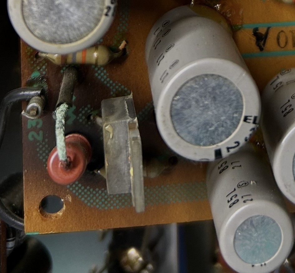 Heat-stressed power supply components in the Pioneer SX-828 before restoration